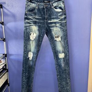 Distressed Blue Denim Jeans